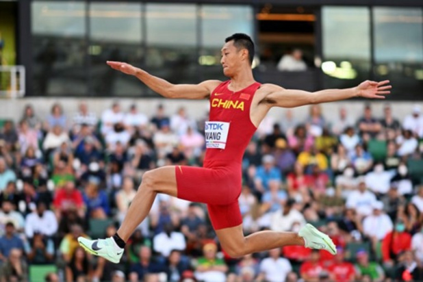 WK atletiek - Verspringer Wang Jianan pakt goud bij laatste sprong