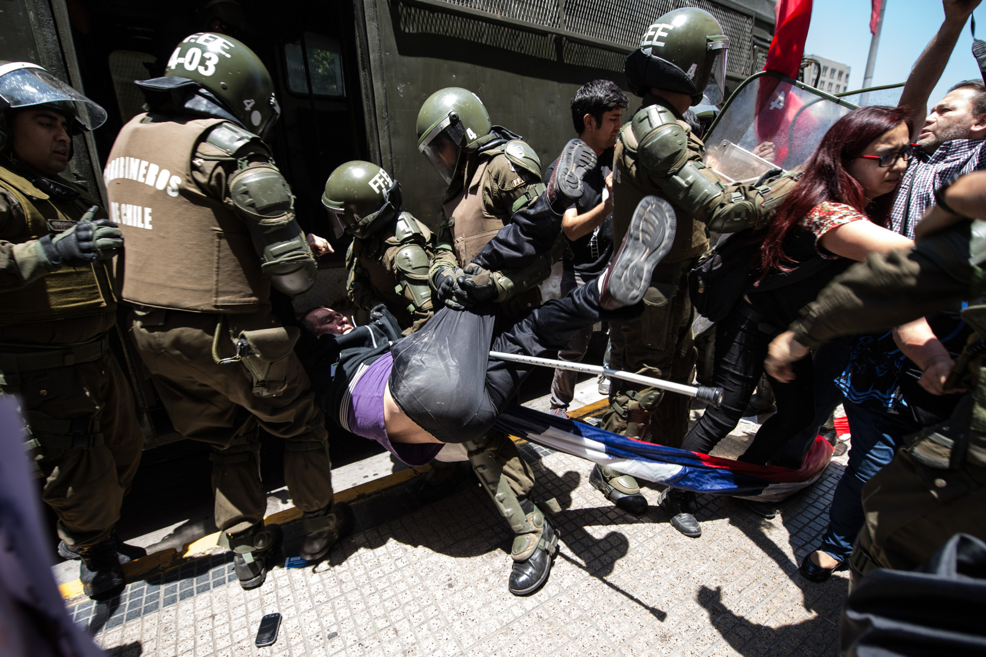 Demonstrant wordt opgepakt in Chili in 2015, XINHUA