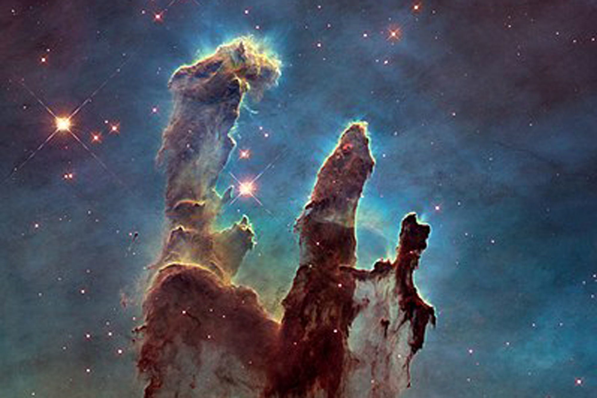 Deze legendarische foto van de Pilaren der Creatie, een deel van de Adelaarsnevel, werd genomen door Hubble in 1995., NASA/ESA Hubble Space Telescope
