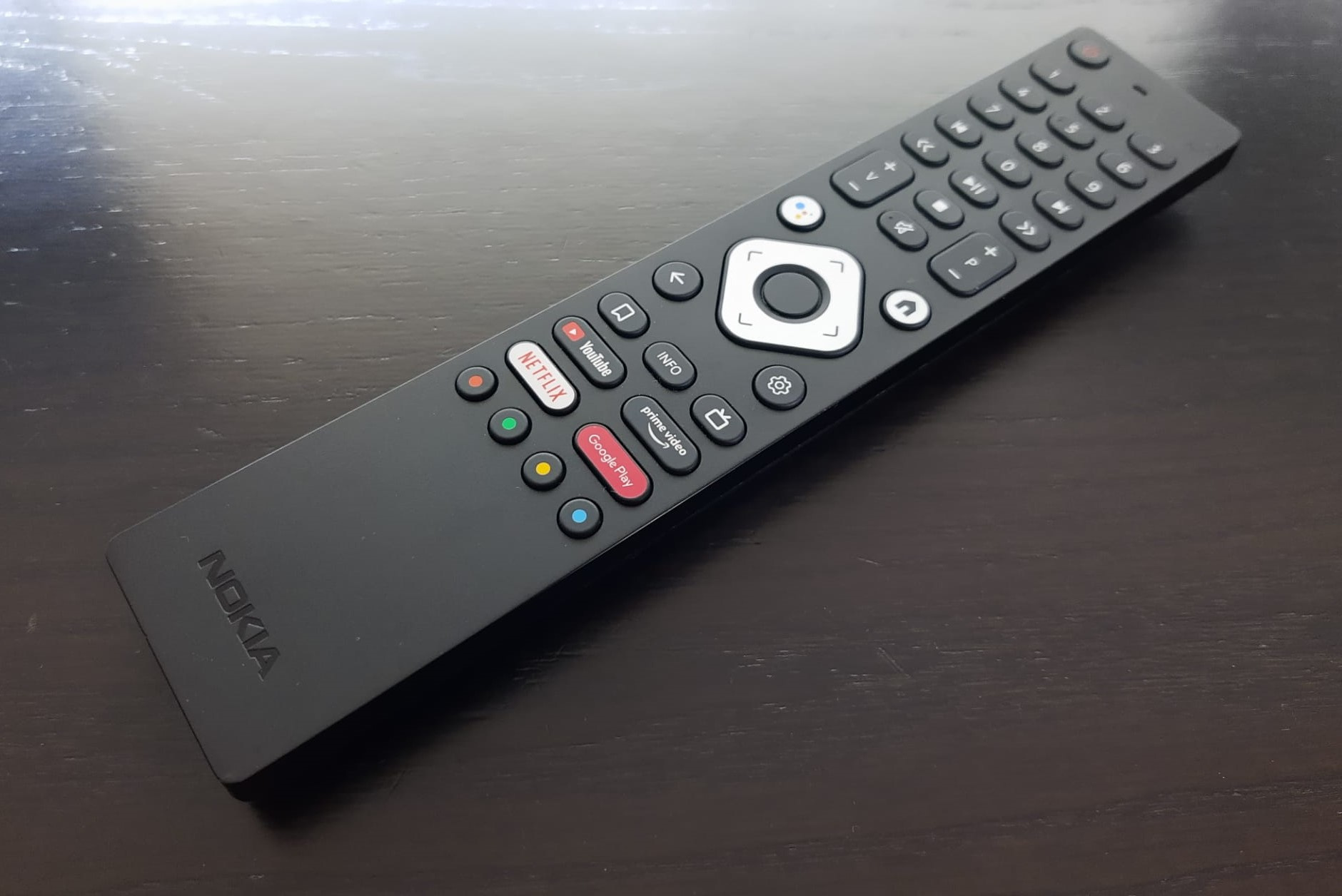 The remote has buttons to direct you to major streaming services and a microphone for voice control., PVL